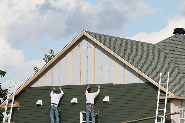 Professional Storm Damage Siding Repair technician working in Syosset, NY